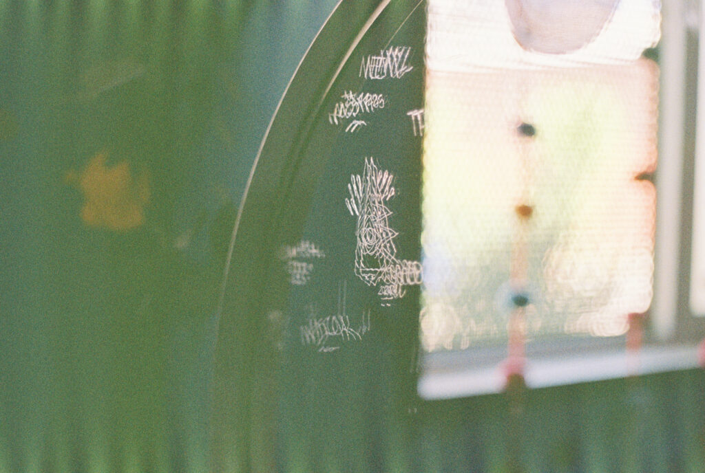 Eye in pyramid carved into a window shot on lomography 800 35mm film